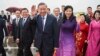 Presiden Vietnam To Lam, tengah kiri, melambaikan tangan saat tiba di Guangzhou, Provinsi Guangdong, China selatan, dalam rangka memulai kunjungan resmi tiga hari ke China, Minggu, 18 Agustus 2024. (Deng Hua/Xinhua via AP)