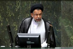 Iranian Intelligence Minister Mahmoud Alavi answers questions from lawmakers in an open session of parliament in Tehran, Iran, Oct. 25, 2016.