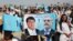 Supporters of Afghan presidential candidate Abdullah Abdullah attend a campaign rally in the Paghman district of Kabul, Afghanistan, June 9, 2014.