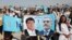 Supporters of Afghan presidential candidate Abdullah Abdullah attend a campaign rally in the Paghman district of Kabul, Afghanistan, June 9, 2014.