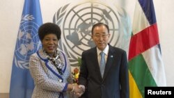 U.N. Secretary-General Ban Ki-moon, right, shakes hands with the head of state of the transitional government of the Central African Republic Catherine Samba-Panza ahead of the United Nations General Assembly at the U.N. headquarters in New York, Sept. 24, 20