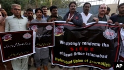 Pakistani journalists take part in a demonstration to show solidarity with the workers of English-language newspaper Dawn, in Karachi, Pakistan, Dec. 5, 2019.