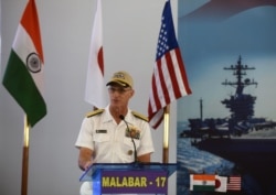 FILE - U.S. Rear Admiral William Byrne speaks in Chennai, India, July 10, 2017.