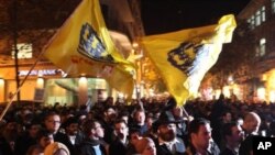 Israeli right-wing activists protest in Jerusalem in support of the rabbis' letter forbidding Jews from selling or renting property to non-Jews as well as to hail settlement activity in the occupied West Bank and East Jerusalem, 23 Dec 2010