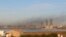 FILE - Smoke rises after an airstrike hit Maitiga airport in Tripoli, Libya, March 5, 2015. Missiles were fired Tuesday at Tripoli, including the city's only functioning airport, forcing authorities to divert flights to another airport to the south. 
