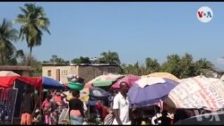 Yon mache piblik louvri nan sou kafou apre nèg ame bloke antre Sid kapital la Pòtoprens