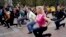 People make outdoor sport exercise to mark World Health Day in Kiev, Ukraine, Friday, April 7, 2017. The World Health Day is a global health awareness day celebrated every year on April 7, under the sponsorship of the World Health Organization (WHO). 