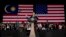 President Barack Obama gestures as he speaks during a town hall meeting at Malaya University in Kuala Lumpur, Malaysia, Sunday, April 27, 2014. 