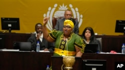 Pemmy Majodina, chief whip of the ruling African National Congress, addresses members of parliament in Cape Town, South Africa, Tuesday, Nov. 21, 2023. 