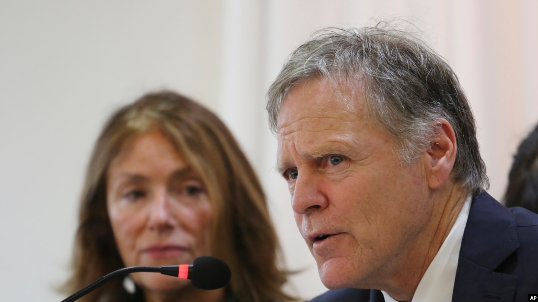 FILE - Fred Warmbier, right, speaks as his wife Cindy listens about their son Otto Warmbier who died after being released by North Korea during a press conference in Seoul, South Korea, Nov. 22, 2019. 