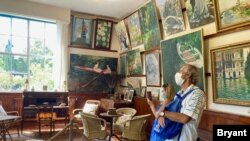 Mostly French tourists are visiting Monet's house this summer. (Photo: Lisa Bryant/VOA)