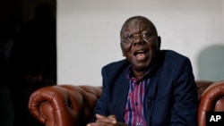 FILE - Zimbabwe opposition leader Morgan Tsvangirai speaks to the Associated Press after giving a news conference at his home in Harare, Zimbabwe, Nov. 16, 2017. 