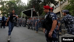 Lebanese policemen are seen in front of a court building in Beirut, Lebanon, Oct. 20, 2017.