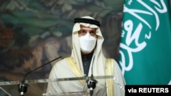 Saudi Arabia's Foreign Minister Prince Faisal bin Farhan Al Saud attends a news conference following talks with Russia's Foreign Minister Sergei Lavrov in Moscow, Russia, Jan. 14, 2021.