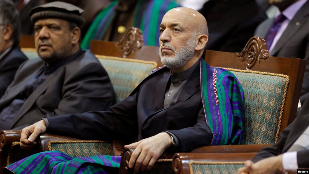 Afghan President Hamid Karzai attends the last day of the Loya Jirga, in Kabul, Nov. 24, 2013. 