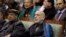 Afghan President Hamid Karzai attends the last day of the Loya Jirga, in Kabul, Nov. 24, 2013. 