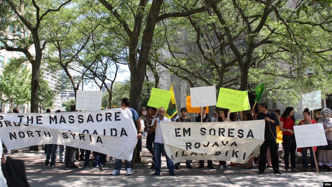 Kurdên li Toronto qirkirina Kurdên Sûrîyê şermezar dikin