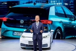 FILE - CEO of Volkswagen Herbert Diess introduces the new VW ID.3 at the IAA Auto Show in Frankfurt, Germany, Sept. 9, 2019.