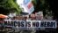 Philippines Marcos Burial: Anti-Marcos protesters holds slogans in a rally outside the Philippine Supreme Court in Manila, Philippines to coincide with the oral arguments following petitions filed by various civil society groups opposing the hero's burial of the late strongman Ferdinand Marcos at the Heroes Cemetery on Wednesday, Sept. 7, 2016.