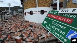 Rubble is strewn across the street in the port town of Lyttelton on February 25, 2011, which was the epicenter of the 6.3 earthquake that devastated the city of Christchurch on February 22, 2011