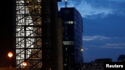 The Europa Building, also known as 'The Egg' (L), was evacuated after toxic fumes leaked from kitchen drains, forcing the EU to switch the venue of its summit less than 24 hours before the meeting in Brussels, Belgium, Oct. 18, 2017. 