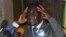 Zimbabwe's President Robert Mugabe speaks at the start of a conference of parties and civic society groups reviewing a draft constitution that, if adopted, will lead to Zimbabwe's next election, at a hotel in Harare, October 22, 2012.