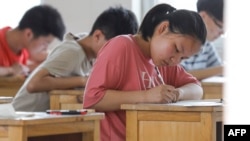 Etudiants passant un examen en Chine, 7 juillet 2020. (Photo AFP)