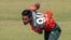 হারারে স্পোর্টস ক্লাবে জিম্বাবুয়ে এবং বাংলাদেশের মধ্যে প্রথম টি-টোয়েন্টি আন্তর্জাতিক ক্রিকেট ম্যাচ চলাকালীন বাংলাদেশের মুস্তাফিজুর রহমান বল ডেলিভারি করছেন। (ছবি-এএফপি/জেকেসাই এনজিকিজানা)