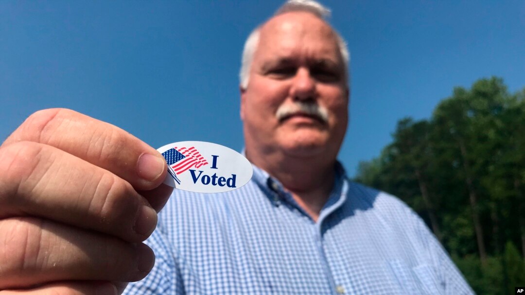 Voter Sandy Blackwell, speaks to a reporter after voting in Mint Hill, N.C. on Sept. 10, 2019.