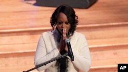 Maya Rockeymoore Cummings pauses while speaking during funeral services for her husband, Rep. Elijah Cummings, Oct. 25, 2019.
