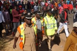 Police were barred from providing security to activists protesting the alleged sexual assault of 17 women, in Lilongwe, Malawi, Jan. 9, 2020. (Lameck Masina/VOA)