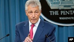 Menhan AS Chuck Hagel berbicara dalam jumpa pers di Pentagon mengenai rencana Amerika menghadapi ancaman Korea Utara, Jumat (15/3).