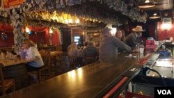 Inside the Little Missouri Saloon &amp; Dining Room in Medora, North Dakota. While the state has the most new coronavirus cases per capita, the pandemic has largely missed Medora, says owner Jim Bridger. (VOA/Matt Haines)