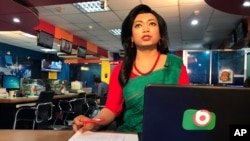 Bangladesh's first transgender news anchor Tashnuva Anan Shishir reads news bulletin, in Dhaka, Bangladesh, March 9, 2021.