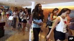 Miss World pageant contestants leave Bali International Convention Center after a rehearsal in Nusa Dua, Bali, Indonesia on September 16, 2013. 