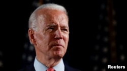 Democratic U.S. presidential candidate and former Vice President Joe Biden speaks about responses to the COVID-19 coronavirus pandemic at an event in Wilmington, Delaware, U.S., March 12, 2020.