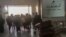This image from UGC video posted on social media on Dec. 26, 2024, reportedly shows travelers rushing in panic out of Sanaa International Airport after it was hit by an Israeli strike. (UGC via AFP)