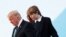 In this photo taken March 17, 2017, Barron Trump, with his father President Donald Trump and mother, first lady Melania Trump, disembark from Air Force One upon arrival at Palm Beach International Airport in West Palm Beach, Fla. 