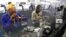 FILE - Diamonds are polished at the Krochmal and Cohen diamond factory in Johannesburg. South Africa has launched an association for young, mainly black entrepreneurs to boost the processing and manufacturing of rough diamonds.