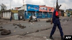Congolese National Police patrol the street Dec. 28, 2018, at Majengo in Goma, in North Kivu province. 