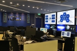 FILE - An interior view of the Interpol Global Complex for Innovation (IGCI) Cyber Fusion Centre, which brings together cybersecurity experts, is seen in Singapore, April 13, 2015.