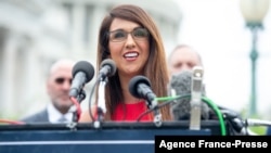 FILE - US Representative Lauren Boebert, Republican of Colorado, alongside members of the House Freedom Caucus, during a press conference outside of the US Capitol in Washington, Aug. 31, 2021.