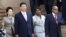 South Africa's President Jacob Zuma (R) wife Bongi Ngema (2nd R) welcome China's President Xi Jinping (2nd L) and wife Peng Liyuan for a working visit to South Africa, in Pretoria March 26, 2013.