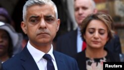 Mayor of London Sadiq Khan speaks after meeting victims and volunteers of the Grenfell apartment tower fire at a church in north Kensington, London, June 18, 2017. 