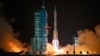 A Long March rocket with a Shenzhou-19 spacecraft atop takes off from the Jiuquan Satellite Launch Center in Jiuquan, northwestern China in the early hours of Oct. 30, 2024.