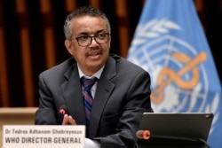 FILE - World Health Organization Director-General Tedros Adhanom Ghebreyesus attends a news conference in Geneva.