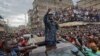 Kenyan opposition leader Raila Odinga gestures to thousands of supporters gathered in the Mathare area of Nairobi, Aug. 13, 2017. 