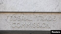 FILE - Signage is seen at the Federal Trade Commission headquarters in Washington, D.C., Aug. 29, 2020.