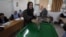A woman casts her vote at a polling station during the first hours of the Jordanian Parliamentary elections, in Al-Salt, Jordan, January 23, 2013.