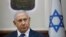 Israel Prime Minister Benjamin Netanyahu attends the weekly cabinet meeting at his office in Jerusalem, Oct. 7, 2018. 